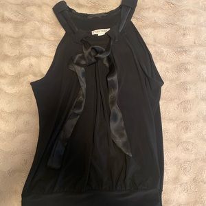 Sleeveless black blouse